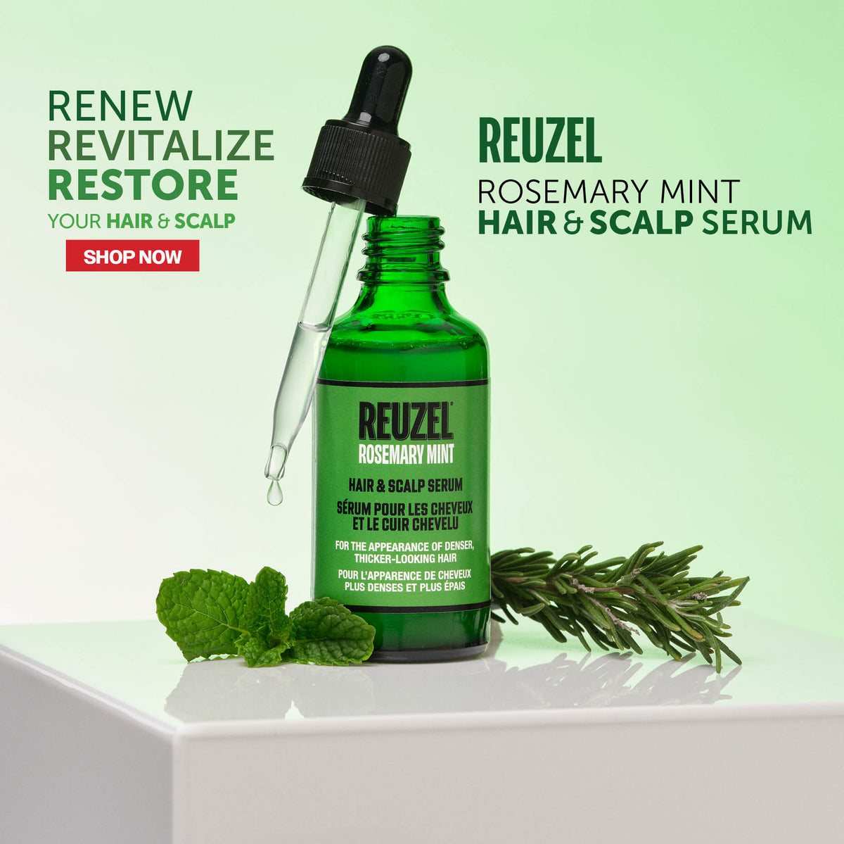 A green glass dropper bottle of Reuzel Rosemary Mint Hair & Scalp Serum displayed on a white pedestal with mint leaves and rosemary sprigs against a light green gradient background.