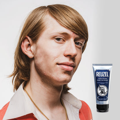 Reuzel Fiber Cream hair styling product in a jar, showing the creamy texture and packaging for textured, flexible hair hold.