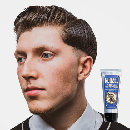 Reuzel Fiber Gel hair styling product showing a close-up of the gel texture in a container, ideal for thick, strong hold styling.