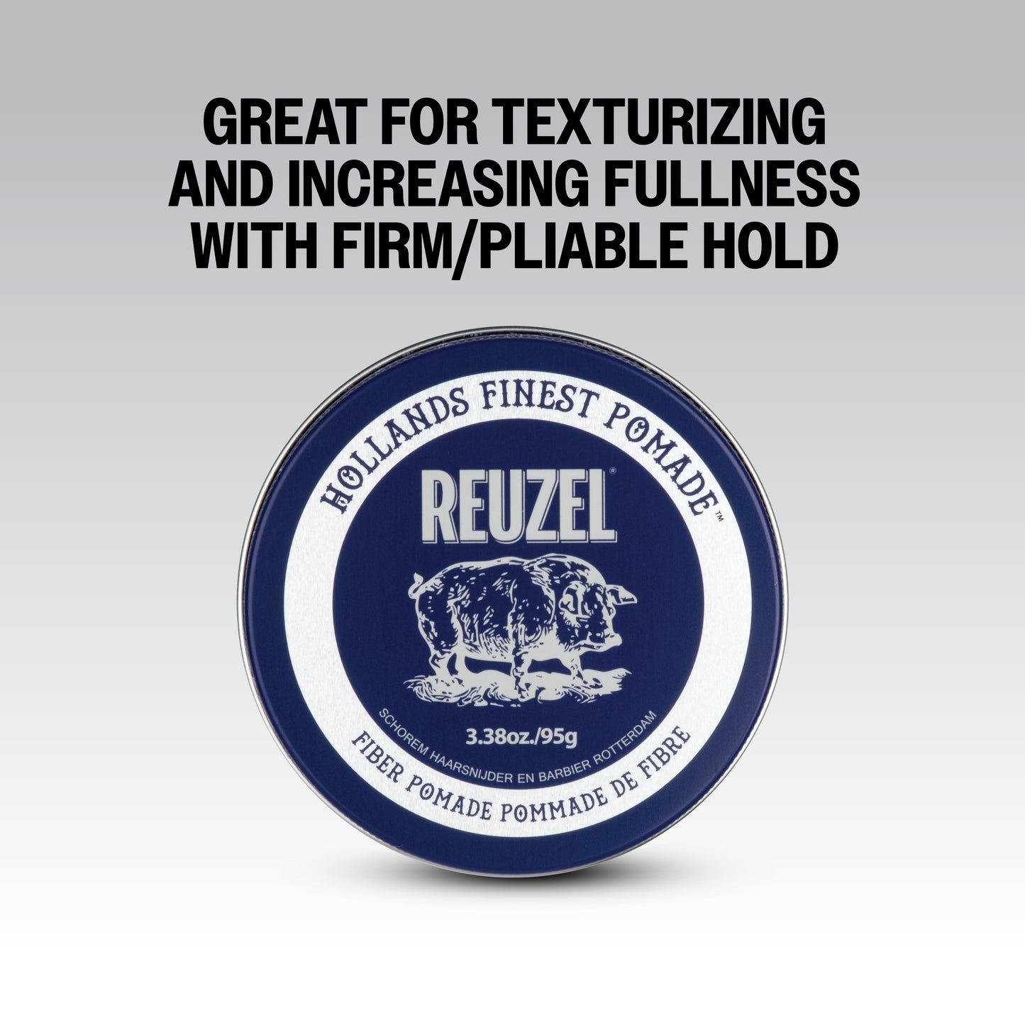 Reuzel Road Trip To Go Fiber Pomade jar with black lid and label, showing product details and branding.