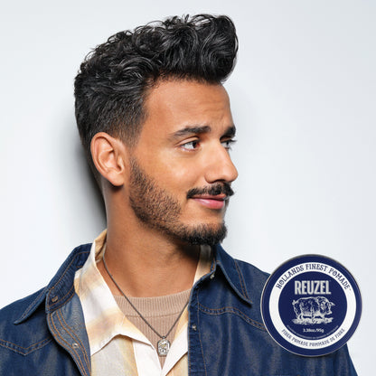 Reuzel Road Trip To Go Fiber Pomade jar with black lid and label, showcasing a versatile hair styling product for textured looks.