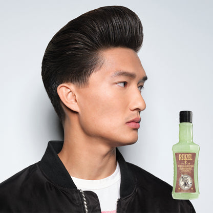 Reuzel Scrub Shampoo bottle with label, showcasing a deep-cleansing haircare product in a sleek packaging design.