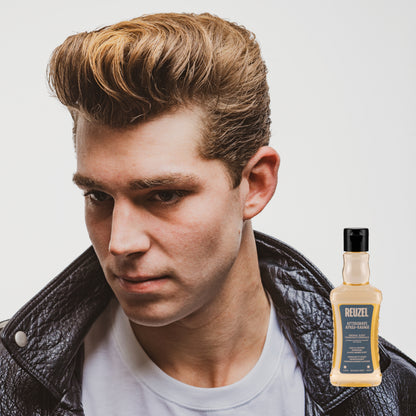 Reuzel aftershave perfume and cologne bottle with a sleek design, showcasing the Reuzel branding and a modern aesthetic.
